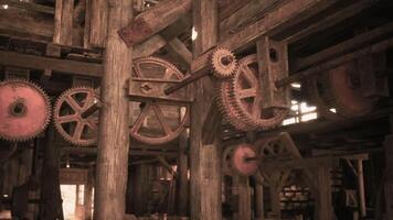 CGI Mechanical gears and wooden structures in an old workshop during daylight video