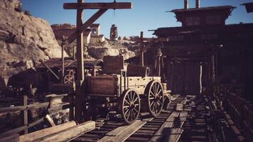 CGI Rustic wooden cart resting on wooden planks in an old western mining town video