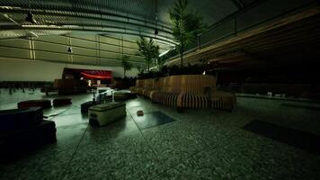 CGI Abandoned airport terminal with overgrown plants and decaying furnishings video