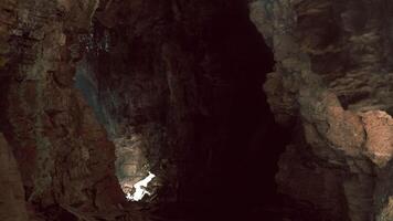 CGI Exploring a dark cave with dramatic rock formations and subtle lighting video