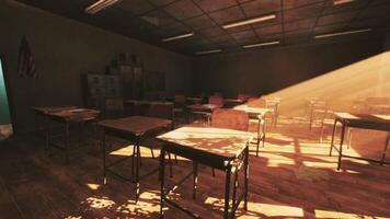 CGI Abandoned old school classroom with empty desks and sunlight streaming in video