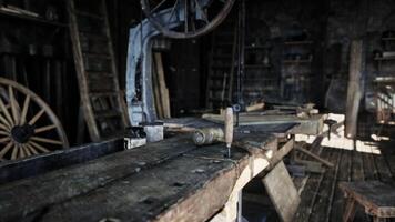 CGI Rustic carpentry workshop filled with vintage tools and worn wooden surfaces video