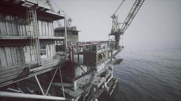 CGI Oil platform structure overlooking calm waters during overcast weather video