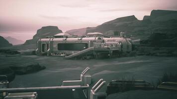 CGI Exploring a colonist base on a distant planet under a hazy sky at dusk video
