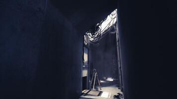 CGI Exploring a dark corridor in an industrial building with overhead wires video