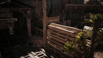 CGI Abandoned wooden structures in a dusty desert settlement under bright sunlight video