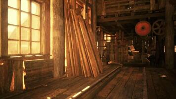 CGI Sunlight streaming through windows in a rustic woodworking shop interior video