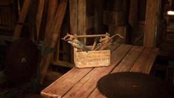 CGI Woodworking tools displayed on a rustic table in an old workshop video