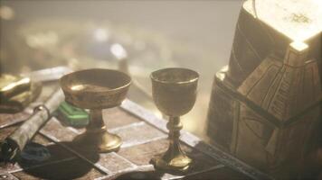 CGI Golden treasures shine in hidden dungeon under dim light video