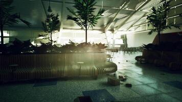 CGI Abandoned airport terminal with overgrown plants and scattered debris at dusk video
