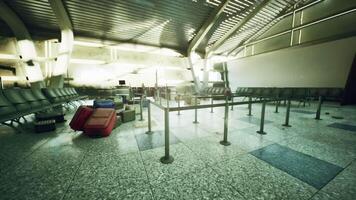 CGI Abandoned airport terminal with scattered luggage and empty seating area video