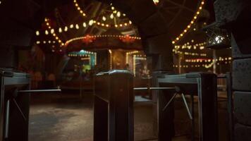CGI Deserted amusement park at night with glowing lights and empty rides video