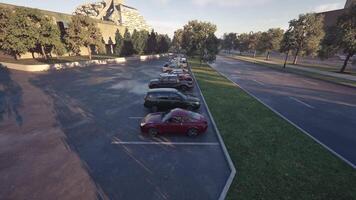 CGI Early morning view of a parking lot lined with several parked cars video