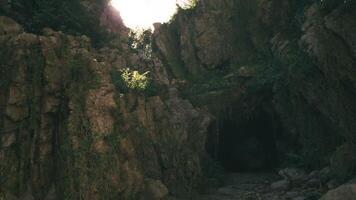 CGI Explore the hidden cave nestled among lush greenery in Indonesias landscape video