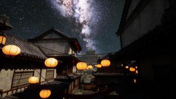 CGI Starlit night in a traditional Japanese village adorned with lanterns video