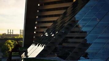 CGI Modern architectural design featuring glass and concrete structures at sunset video