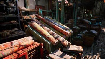 CGI Vibrant textiles displayed in an old market of a small African town video