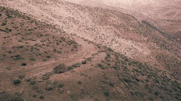 CGI Winding dirt path through the arid landscape of Pamir in Tajikistan video