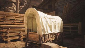 CGI Covered wooden wagon in a rustic storage area near wooden planks video