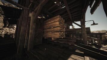 CGI Wooden planks stacked in a rustic shed of an old mining town during midday video