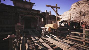 CGI Rustic wooden cart transporting logs at a mining site in a mountainous area video