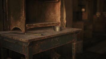 CGI Old wooden table with a metal mug and stick in a dimly lit room video