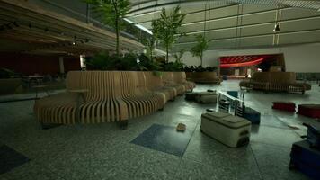 CGI Abandoned airport lounge with scattered luggage and empty seating video