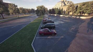 CGI A quiet parking lot with several cars under clear skies in the late afternoon video