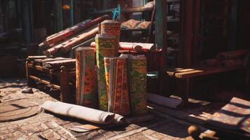 CGI Colorful rugs stacked in a bustling market of a small African town video