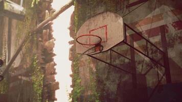 CGI An old basketball hoop surrounded by vines in an abandoned urban space video