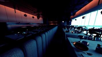 CGI Empty restaurant interior with dim lighting and well set tables at evening video