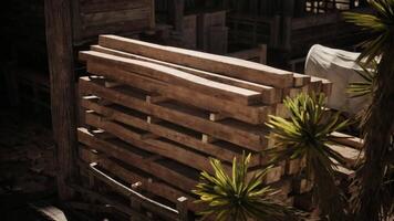 CGI Stacked wooden planks behind a rustic structure in a tranquil outdoor setting video