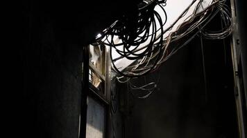 CGI Exploring a dark, concrete industrial space with exposed wires video