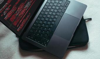 Alert of virus attack on laptop screen. malicious software infection on computer. cyber security awareness. protect business information from threat attacks. photo
