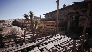CGI Desert ghost town with wooden structures and sparse vegetation during daylight video