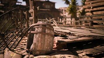 CGI Old wooden barrel rests on weathered ground in a deserted western town video