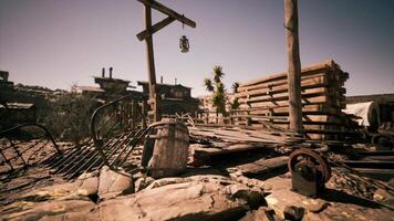 CGI Desolate old mining town with wooden structures under bright midday sun video