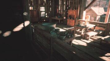 CGI Rustic wooden interior with furniture and utensils in a sunlit workshop video