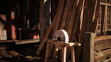 CGI Woodworking setup with a lathe and stacked planks in a workshop during daylight video
