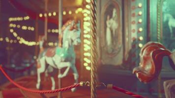 CGI Empty amusement park at night featuring a vintage carousel with bright lights video
