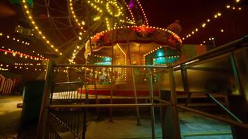 CGI Empty amusement park at night with bright lights and a deserted carousel video