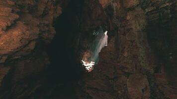 CGI Exploring the breathtaking light beams in a majestic cave system video
