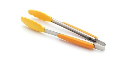 A pair of yellow and orange tongs photo