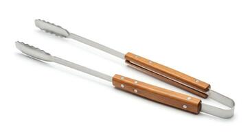 Two wooden tongs with handles on a white background photo