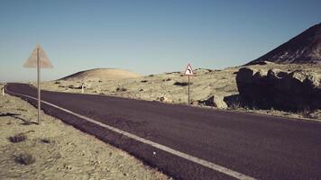 CGI Lonely road winding through the vast Mongolian desert under clear skies video