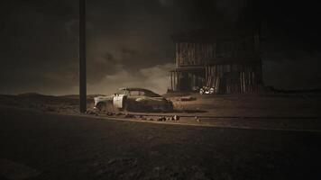 CGI Abandoned car beside a dilapidated building under a stormy sky at dusk video