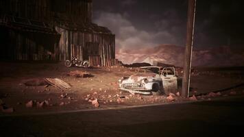 CGI Abandoned car and motorcycle in a desolate landscape under a cloudy sky video