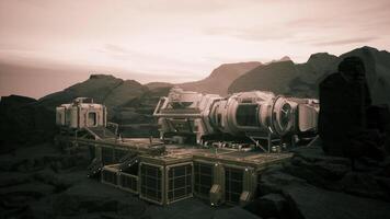 CGI Colonist base established on a distant planet with rocky terrain under twilight video
