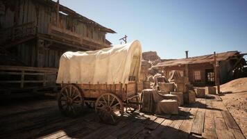 CGI Wooden wagon and rustic buildings in an old western town at midday video