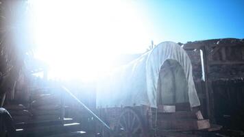 CGI Historical wagon under bright sunlight at a rustic settlement video